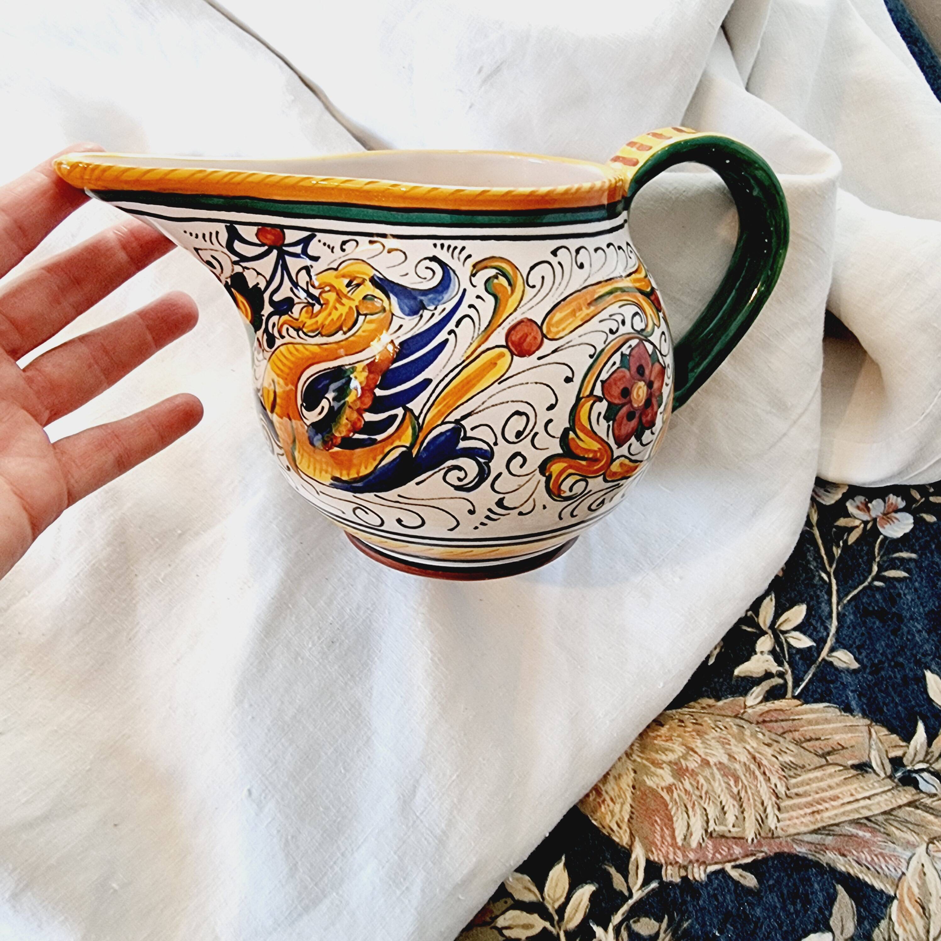 Majolica ceramic jug by R. Deruta, Italy, hand-painted, with a long spout.  Decorated with a dragon tree