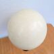 Ostrich egg on a brass stand