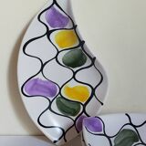 Three vintage free-form ceramic ravine dishes from the 1950s