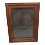 Old frame in worked wood