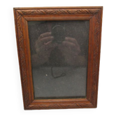 Old frame in worked wood