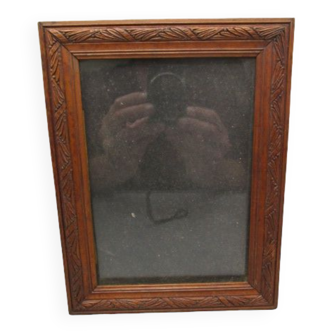 Old frame in worked wood