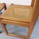 Pair of vintage sleigh chairs in beech wood and cane from the 70s