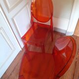 2 Chaises orange Victoria Ghost design Starck éditées par Kartell