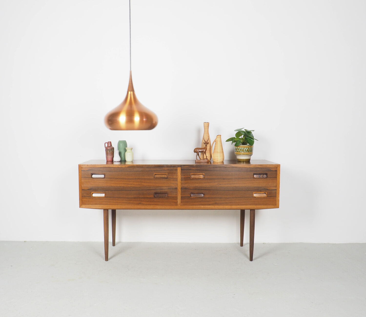 Hundevad Rosewood chest of drawers on high legs, 1960's