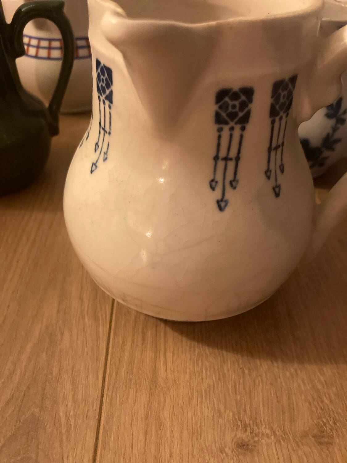 During antique milk jugs at a flea market.