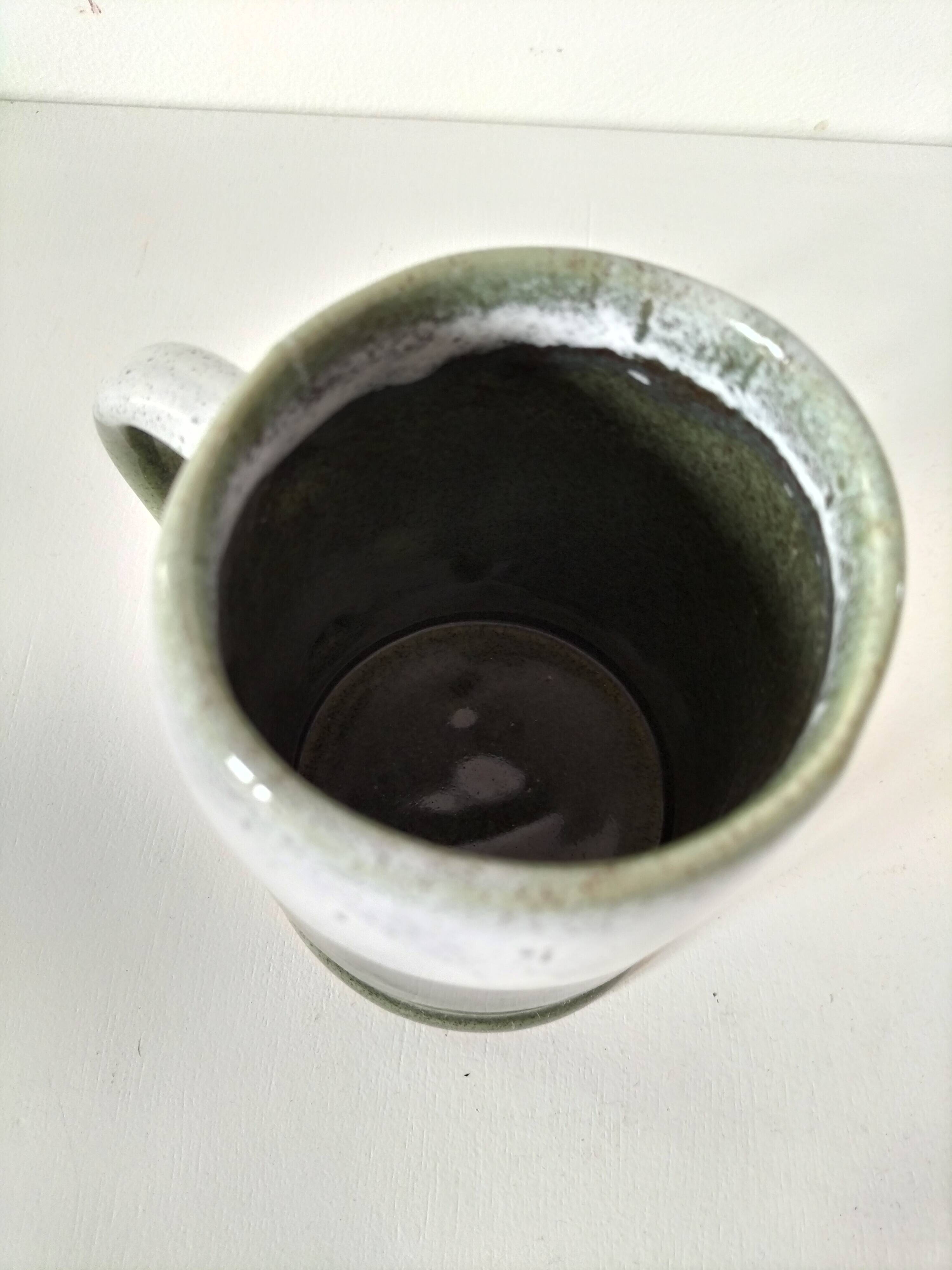 Glazed earthenware mug