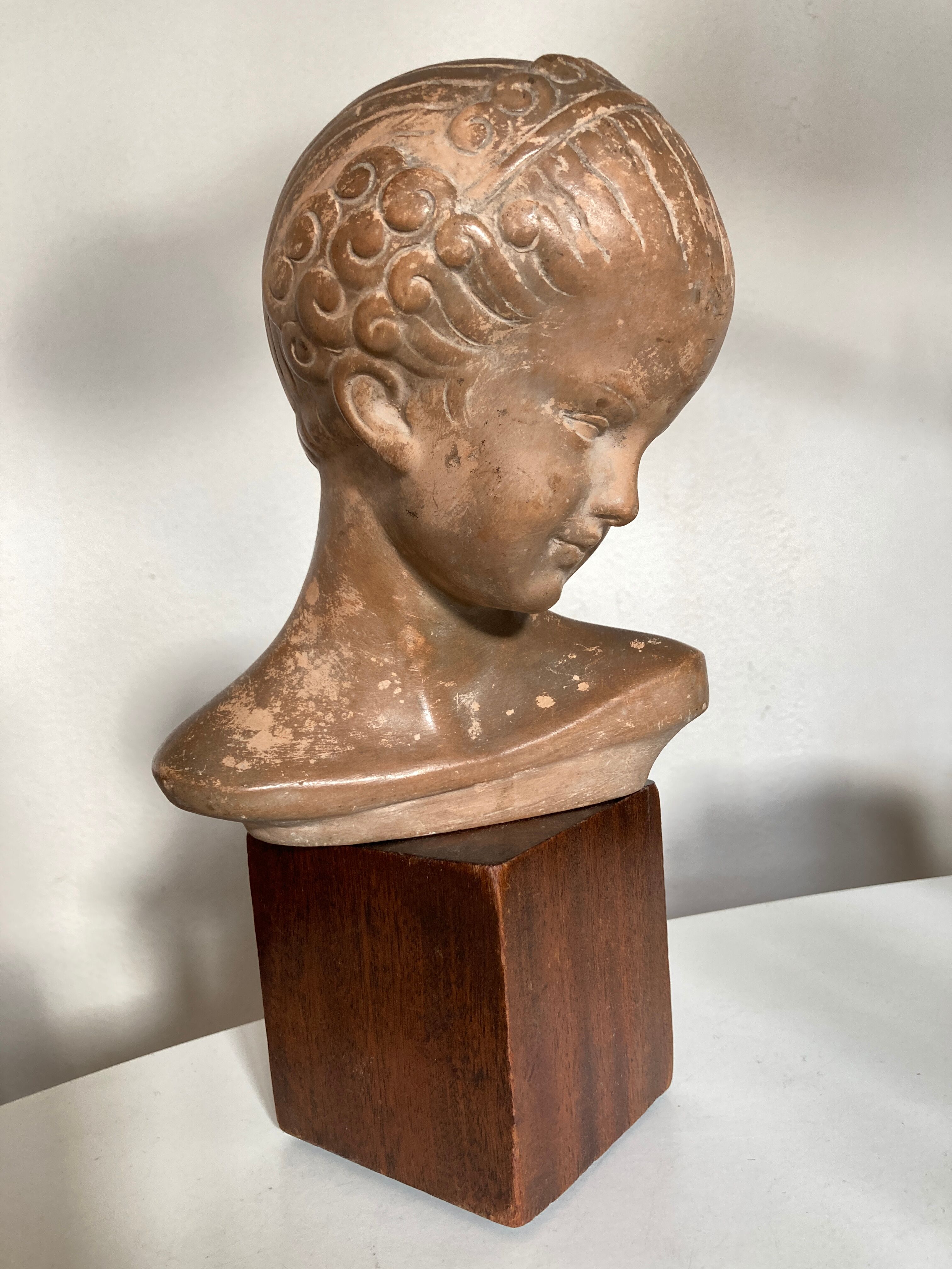Child's head in terracotta 1920 wooden base
