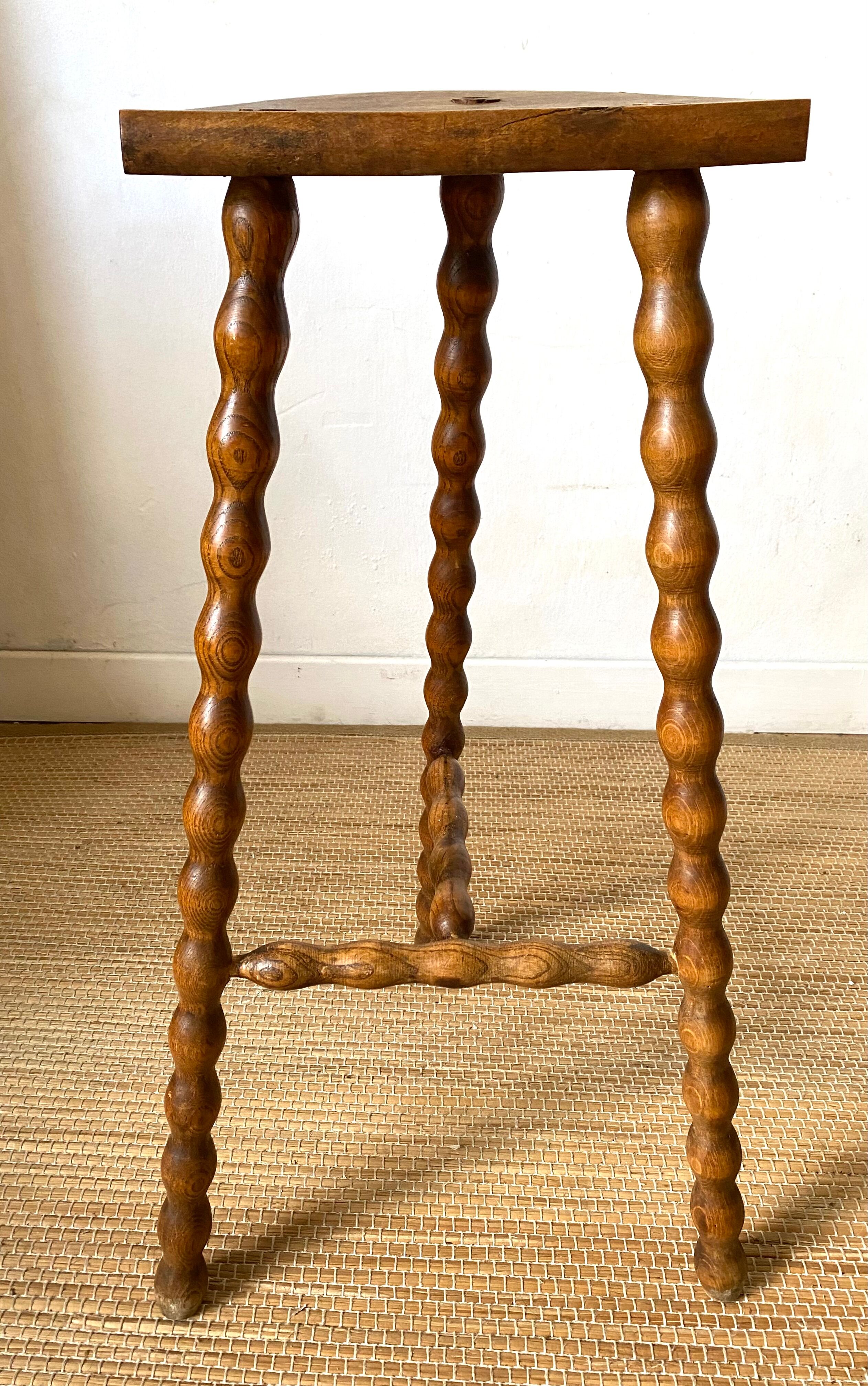 High tripod stool or plant holder