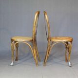 Two Kohn chairs, No. 529, circa 1910, bistro style, caned, bentwood