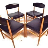Four Scandinavian-style chairs