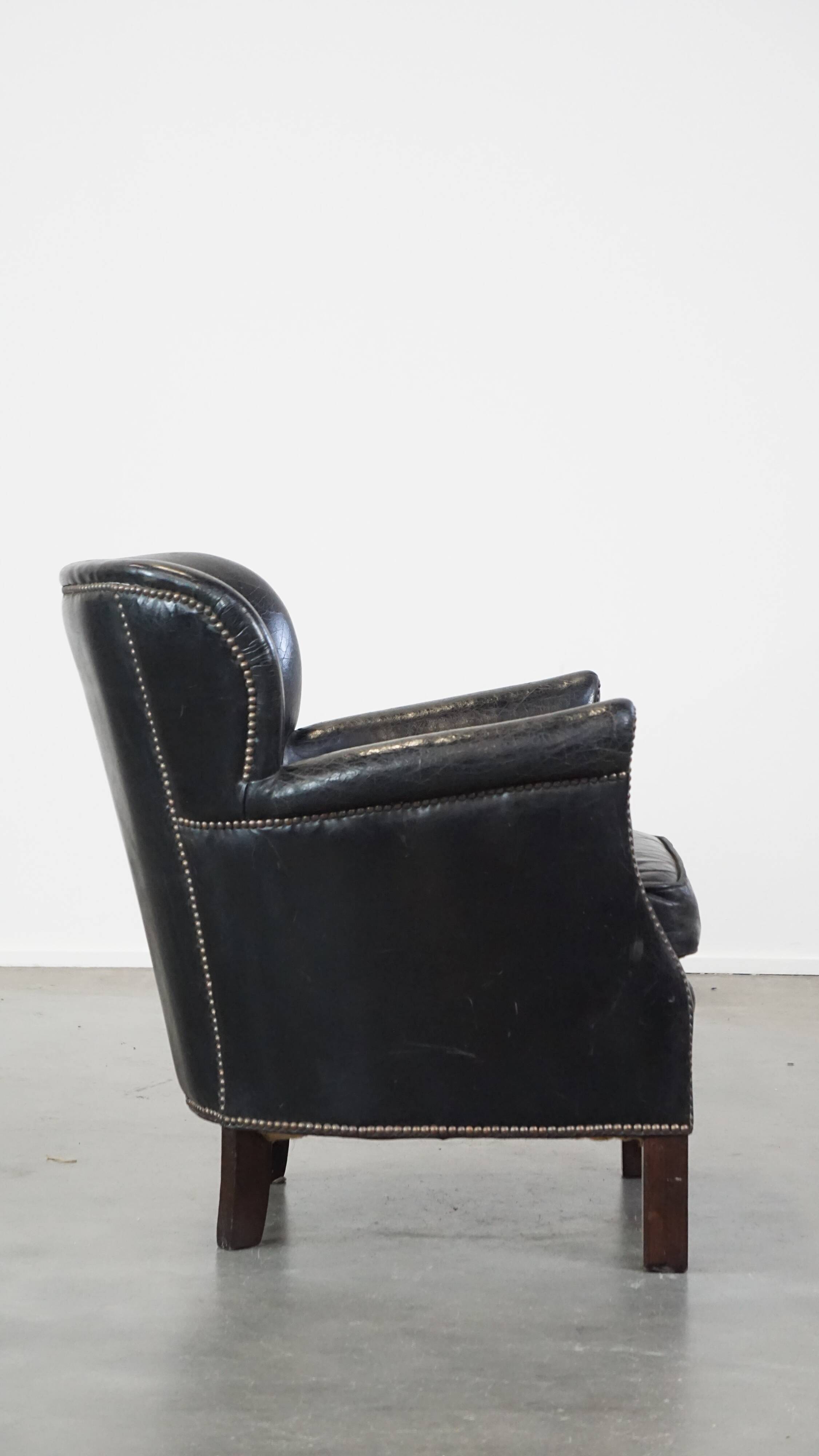 Fauteuil en cuir de vachette noir