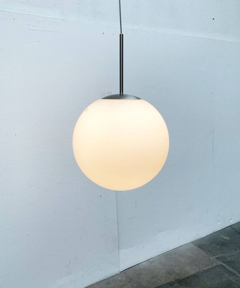 Suspended glass ball lamp by Peill & Putzler.