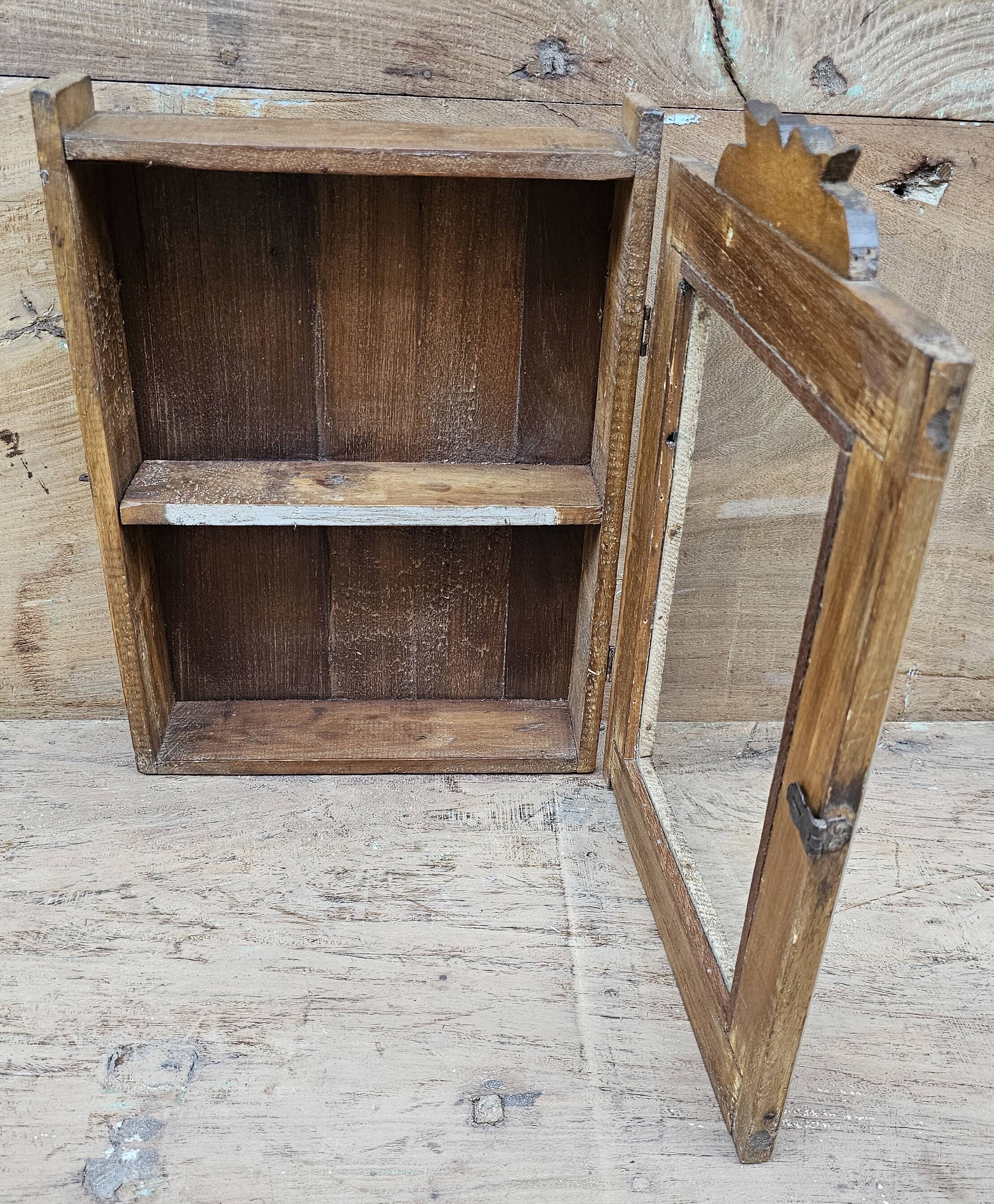 Old tribal wall display case in Burmese teak