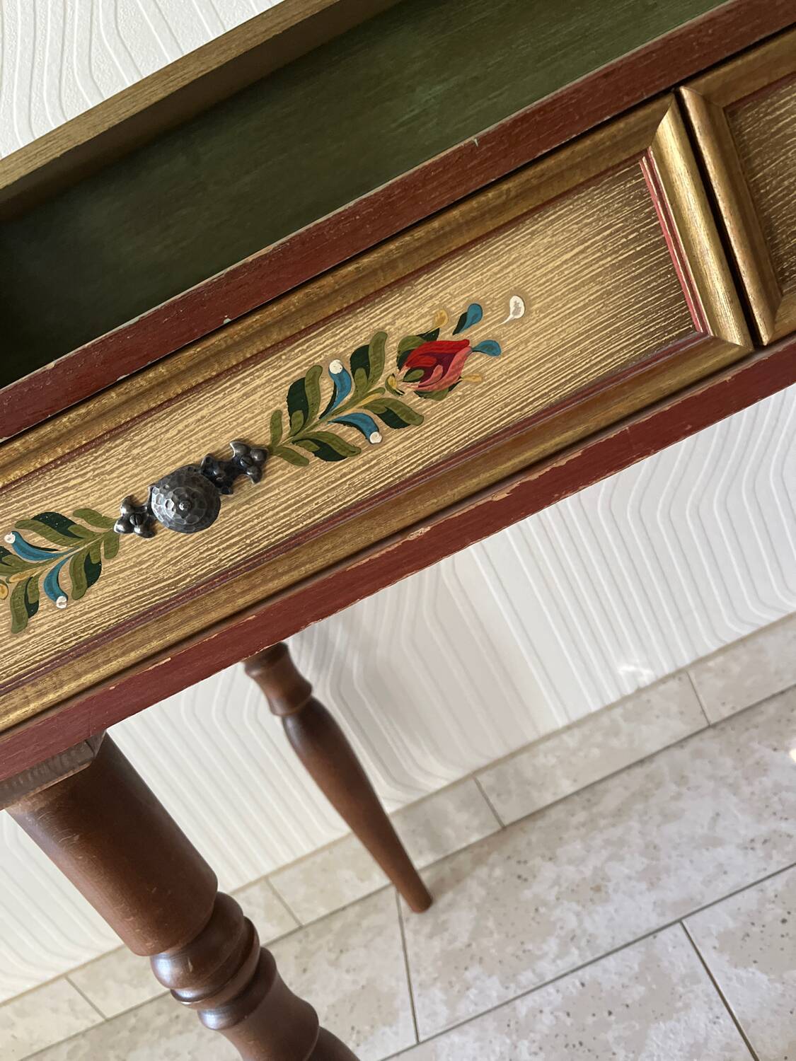 Wooden dressing table with olive green chair and floral patterns
