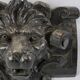 Sculpture de tête de lion en bois teinté