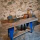 Vintage industrial workbench table with cast iron legs (Aux Forges de Vulcain)