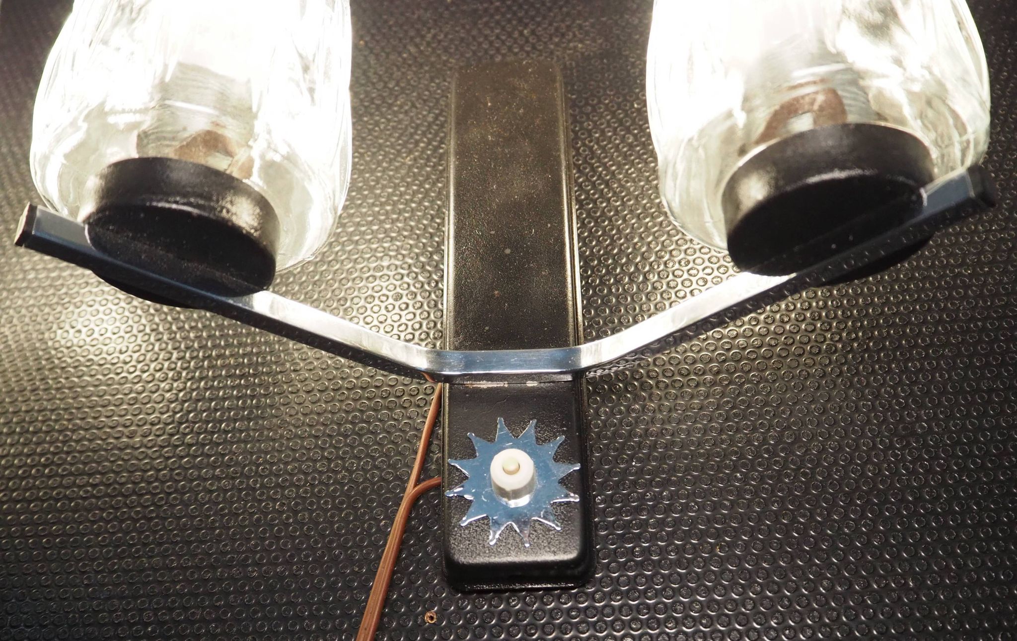 Pair of wall lights from the 1950s-1960s with a push button switch.