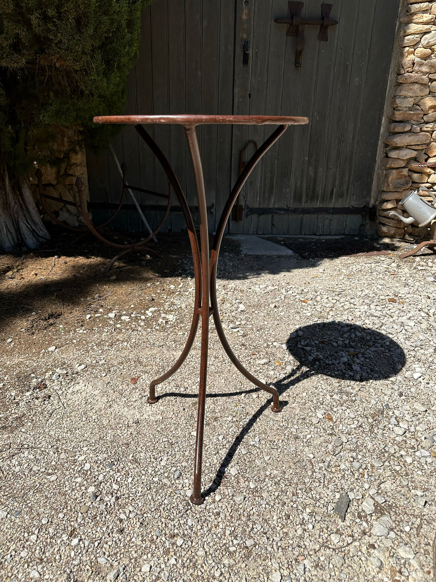 Artisanal wrought iron side table