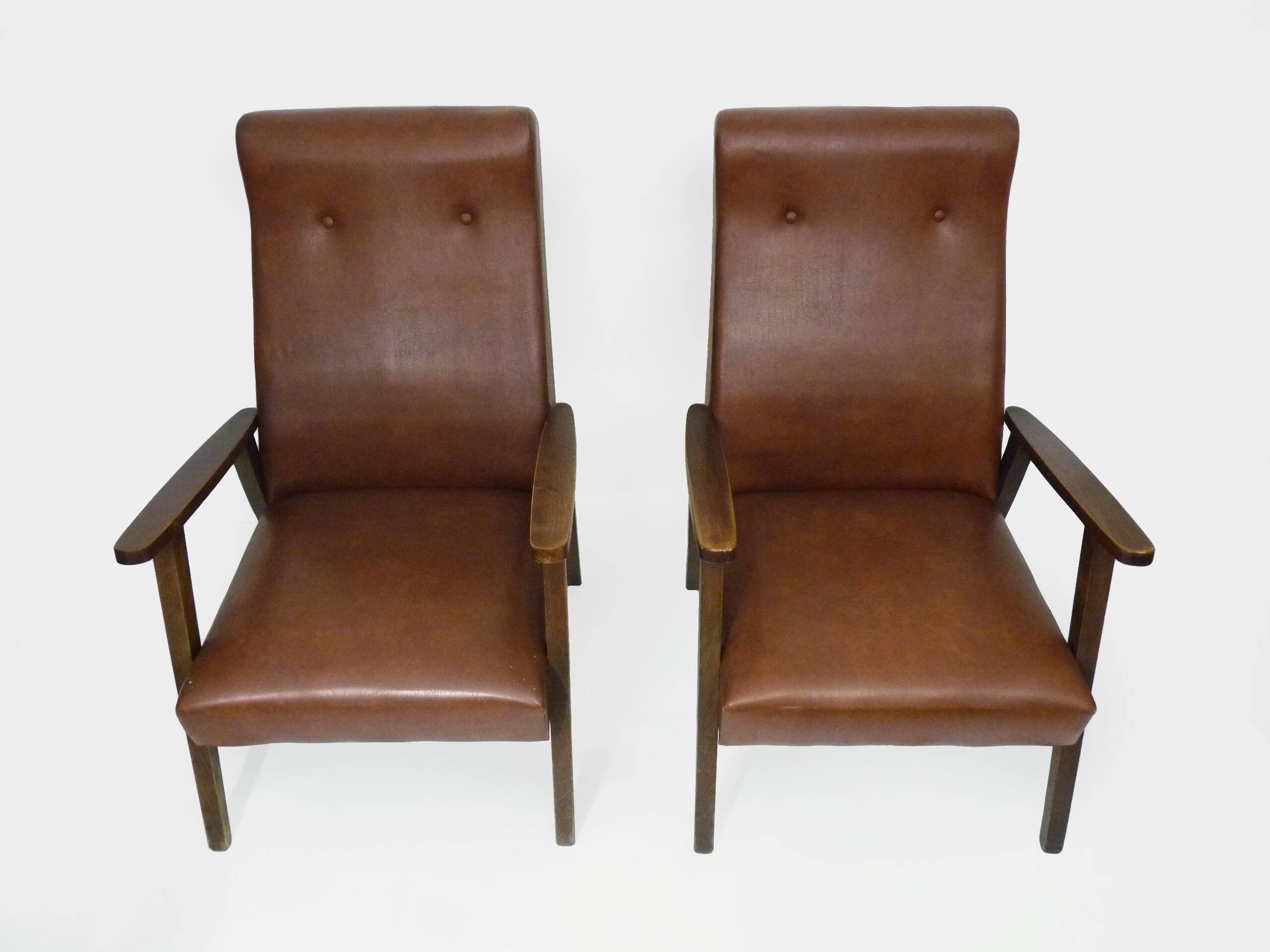 Pair of Scandinavian armchairs in brown leatherette and wood from the 50s and 60s