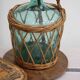 Glass and wicker demijohn