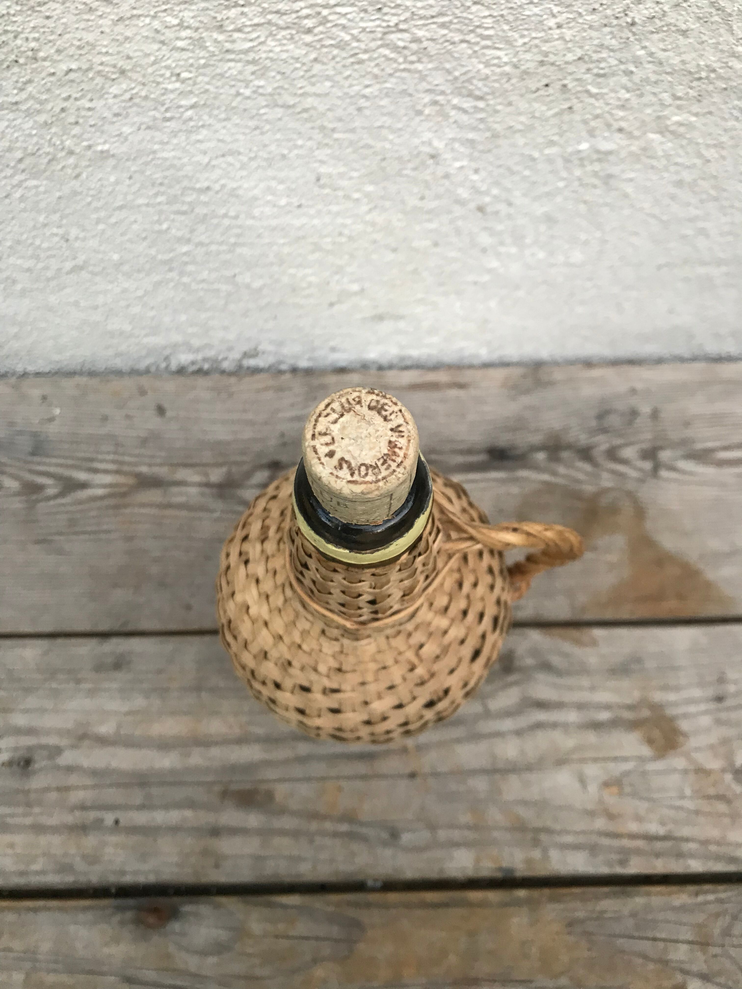 Bottle old woven wicker rattan