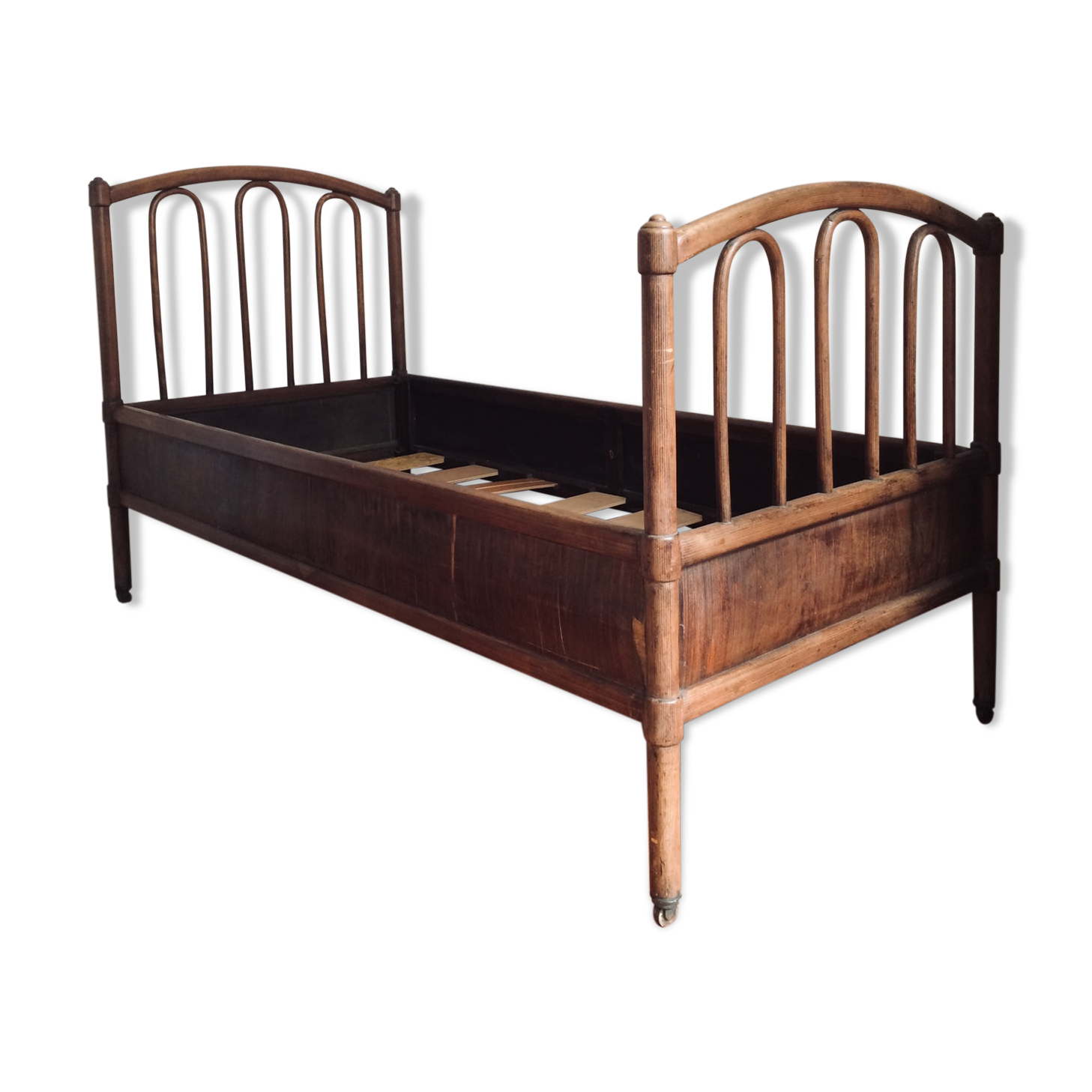 Old curved wooden bed - one person