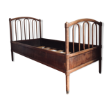 Old curved wooden bed - one person