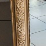 miroir ancien en bois et stuc doré