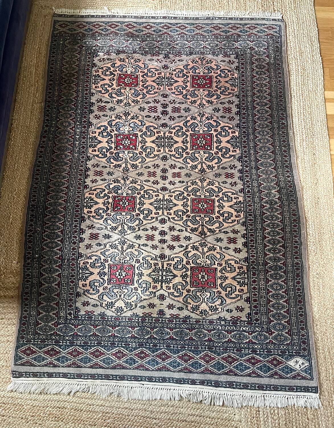 Antique Persian rug, signed.