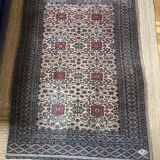 Antique Persian rug, signed.