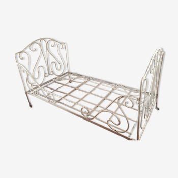 Folding wrought iron bed