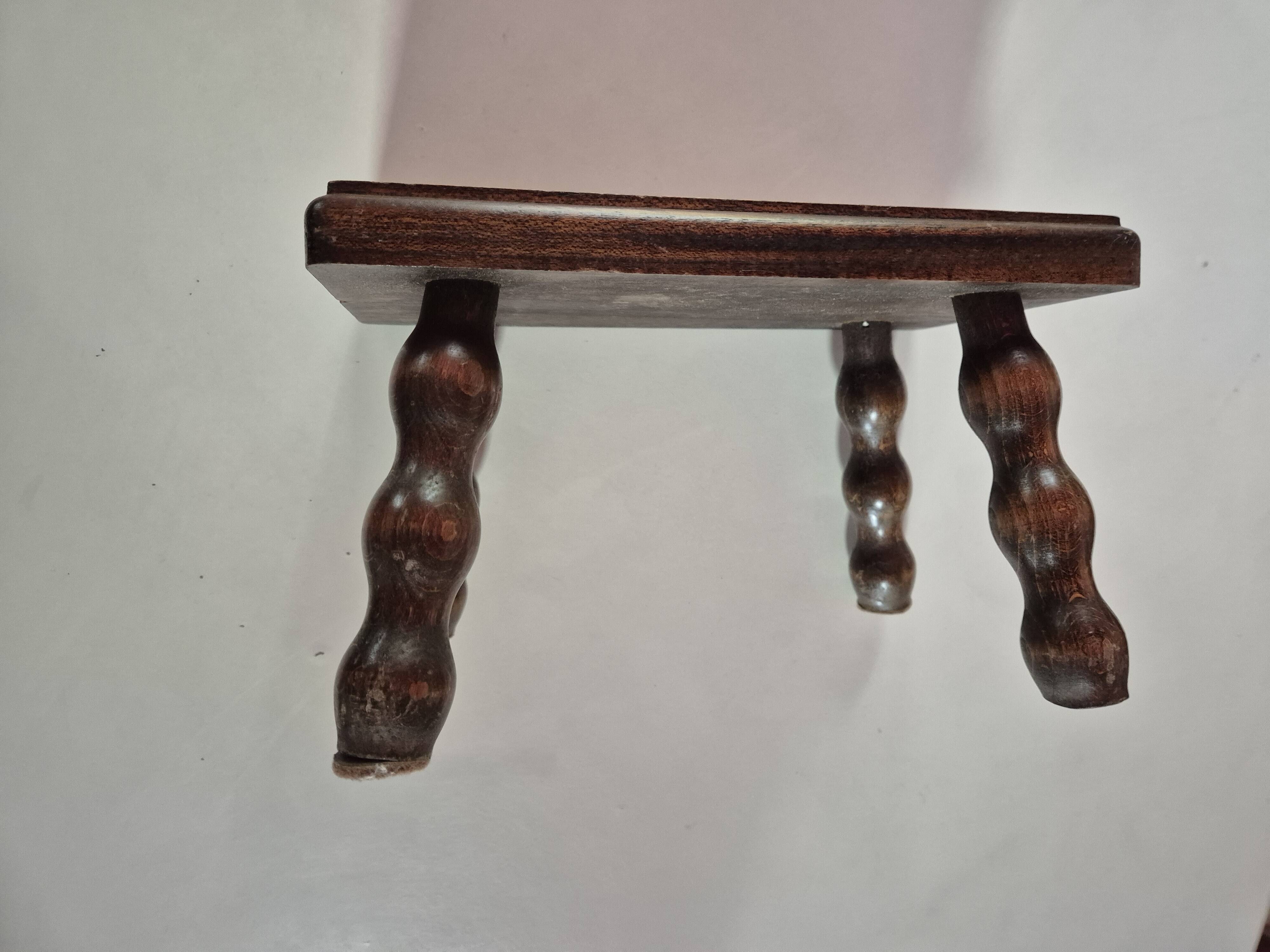 Mini footstool with vintage twisted legs.
