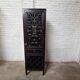 Cabinet chinois vintage noir patiné – porte sculptée ajourée – esprit