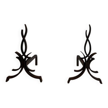 Pair of Wrought Iron Andirons with Stylised Flamboyant Uprights and Enrobed Feet