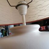 Vintage ceramic table lamp and golden lampshade.
