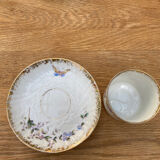Porcelain cup with earthenware lions
