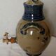 Old belly vinegar in beige and blue enamelled gres