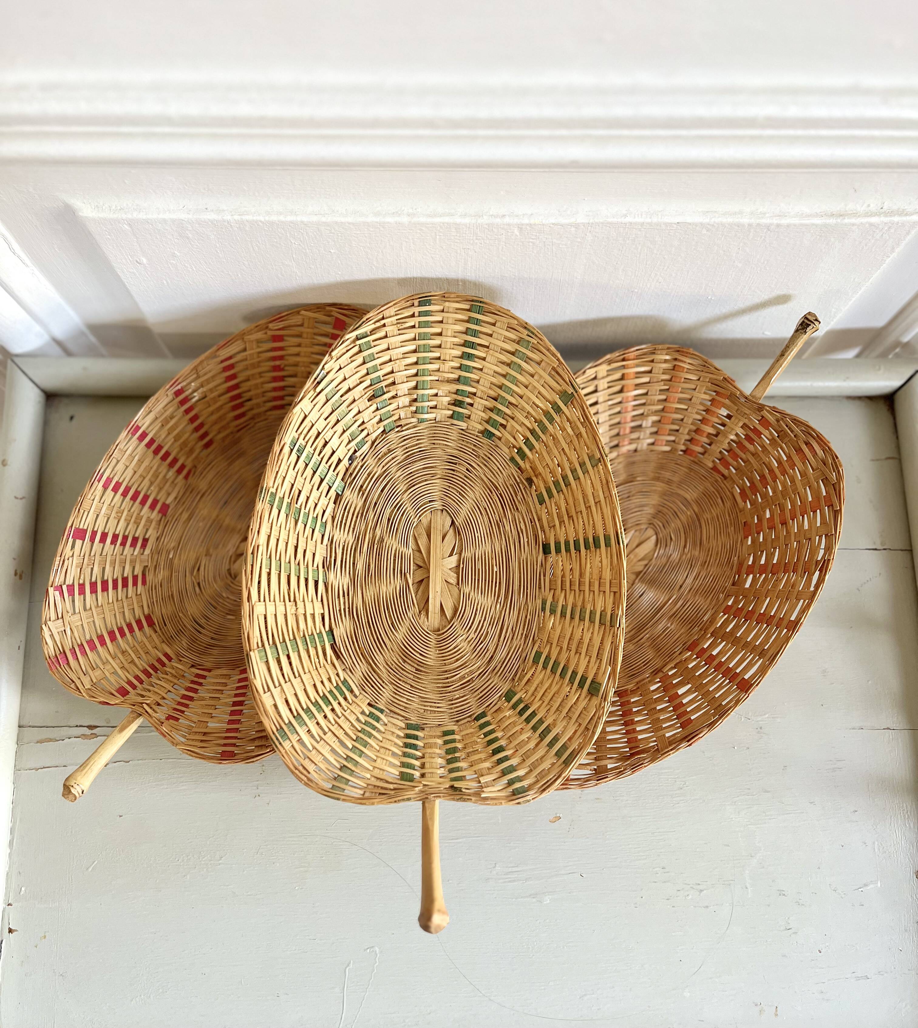 Trio of vintage wicker and bamboo baskets