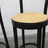 Pair of Baumann Dialog model stools in black and yellow and blue imitation leather, 1990