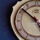 Vintage formica clock silent asymmetrical wall pendulum "FFR Morbier yellow black"