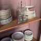 Small Parisian Art Deco glass cabinet with white patina - a timeless classic.