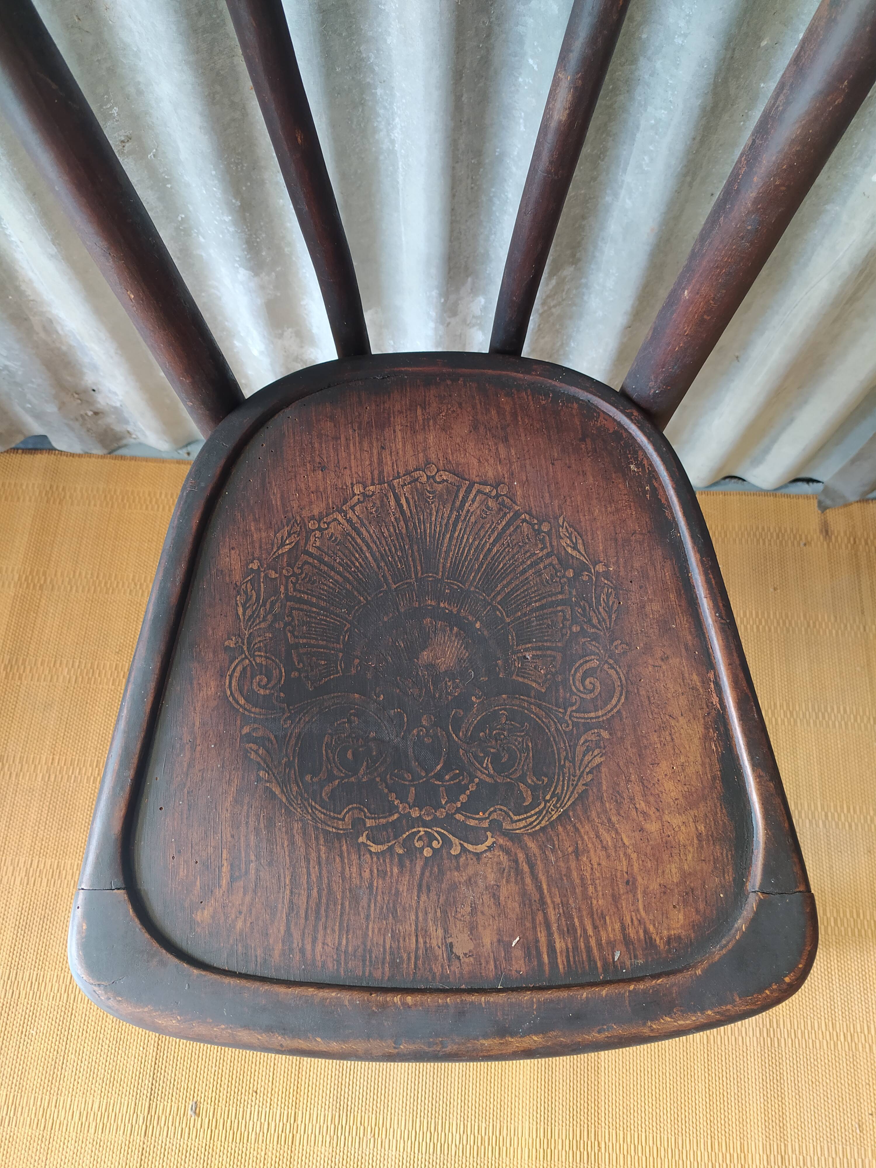 Curved wooden bistro chair