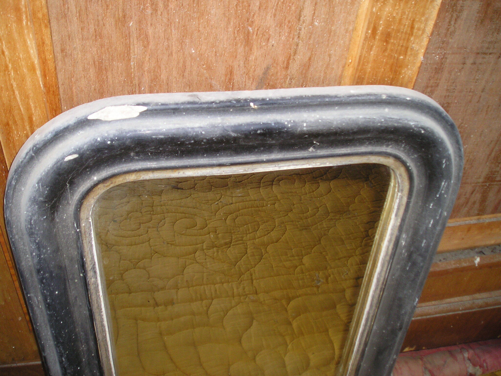 Antique wall mirror in wood and blackened stucco 43x55cm