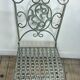 Patinated green folding wrought iron garden set with 1 table + 2 chairs.