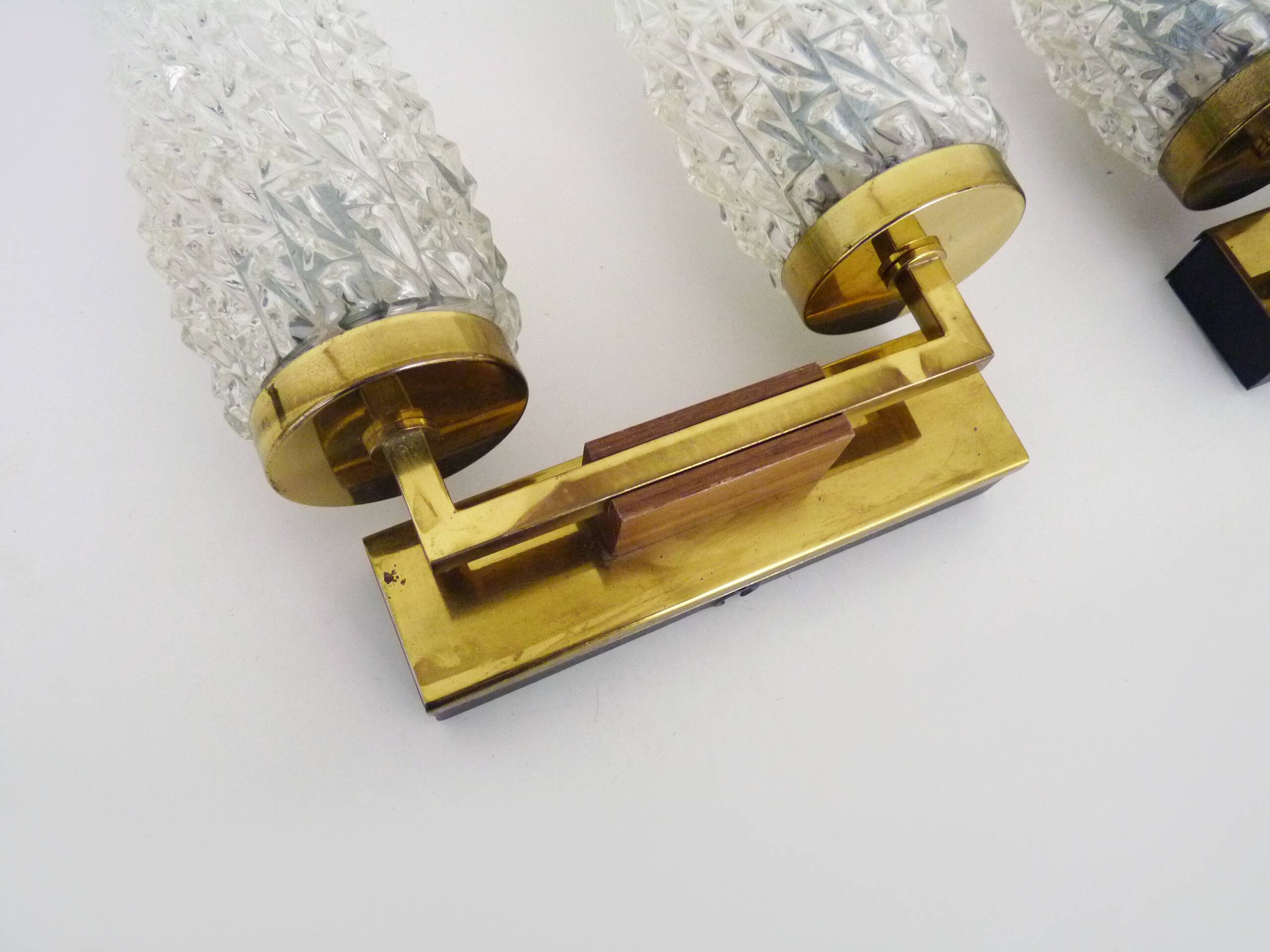 Pair of double-light wall lights, brass, teak globe, glass tubes. 50s-60s