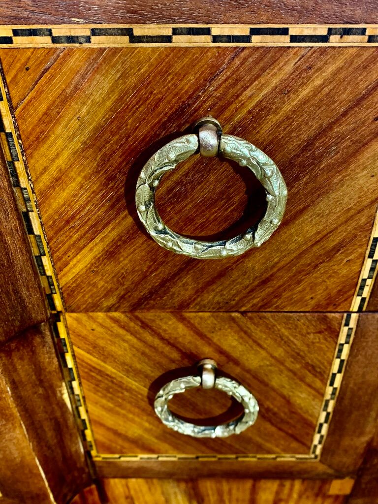 Transition style chest of drawers in rosewood and violet wood, ebony and gilded bronzes