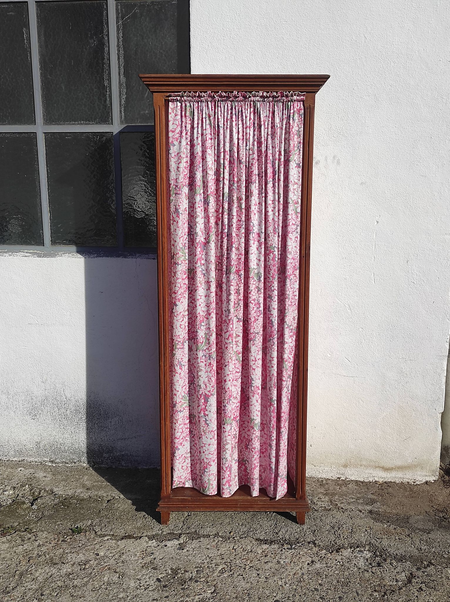 Old wardrobe in old wood and vintage fabric