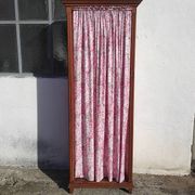 Old wardrobe in old wood and vintage fabric