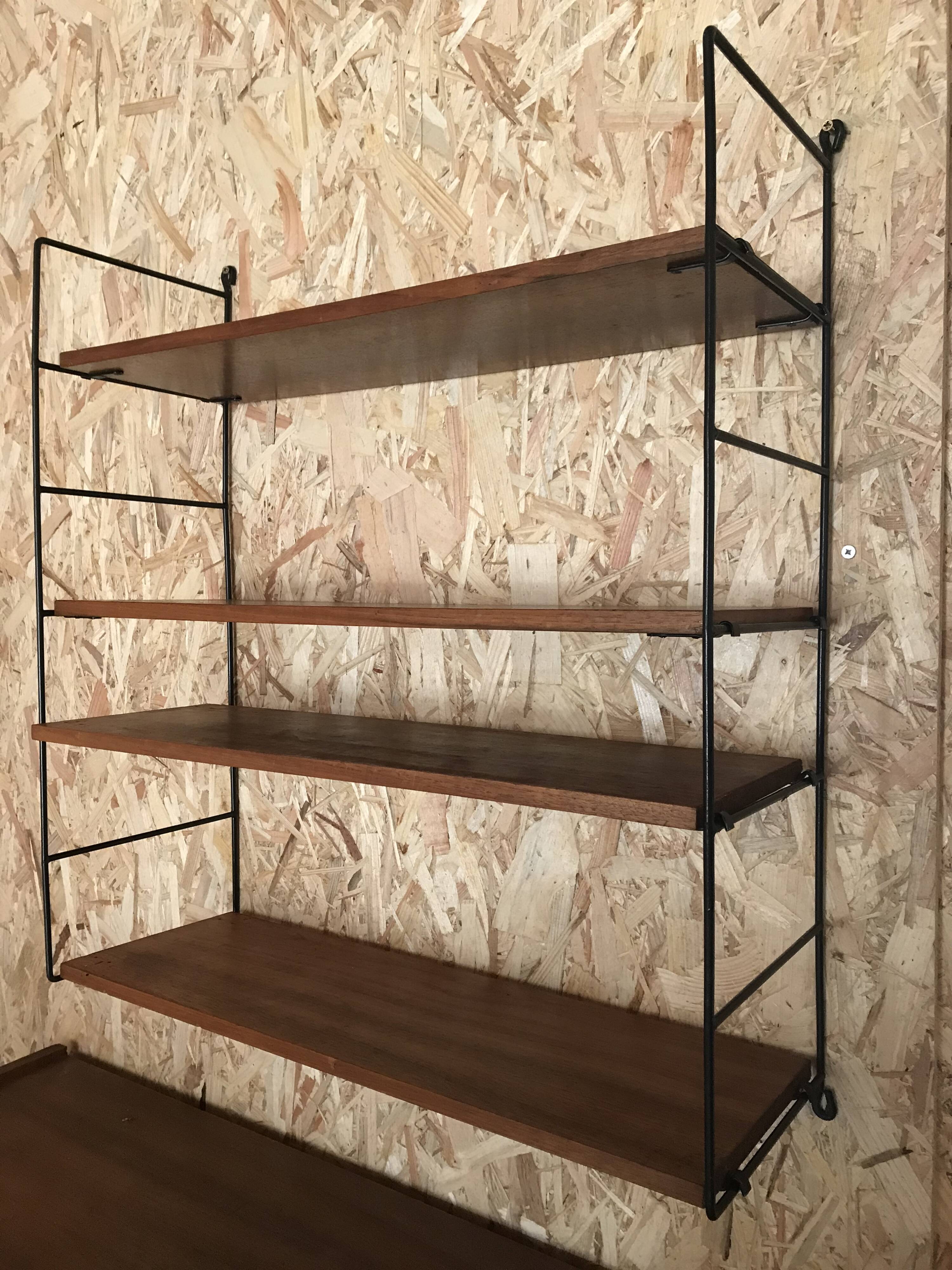 Vintage four-tier string wall shelf